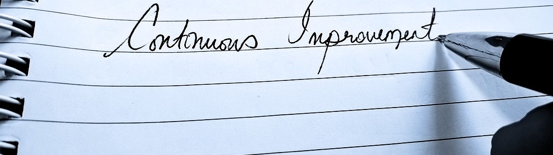 photo of handwriting on ruled notepad: Continuous Improvement